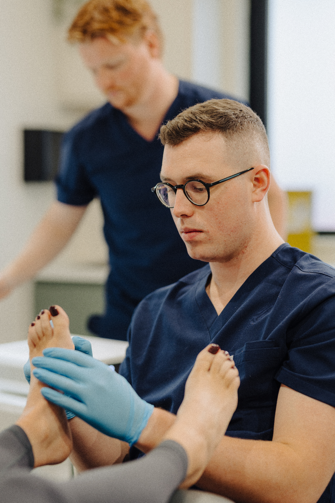 The Verruca Clinic NI podiatry team treating a patient together
